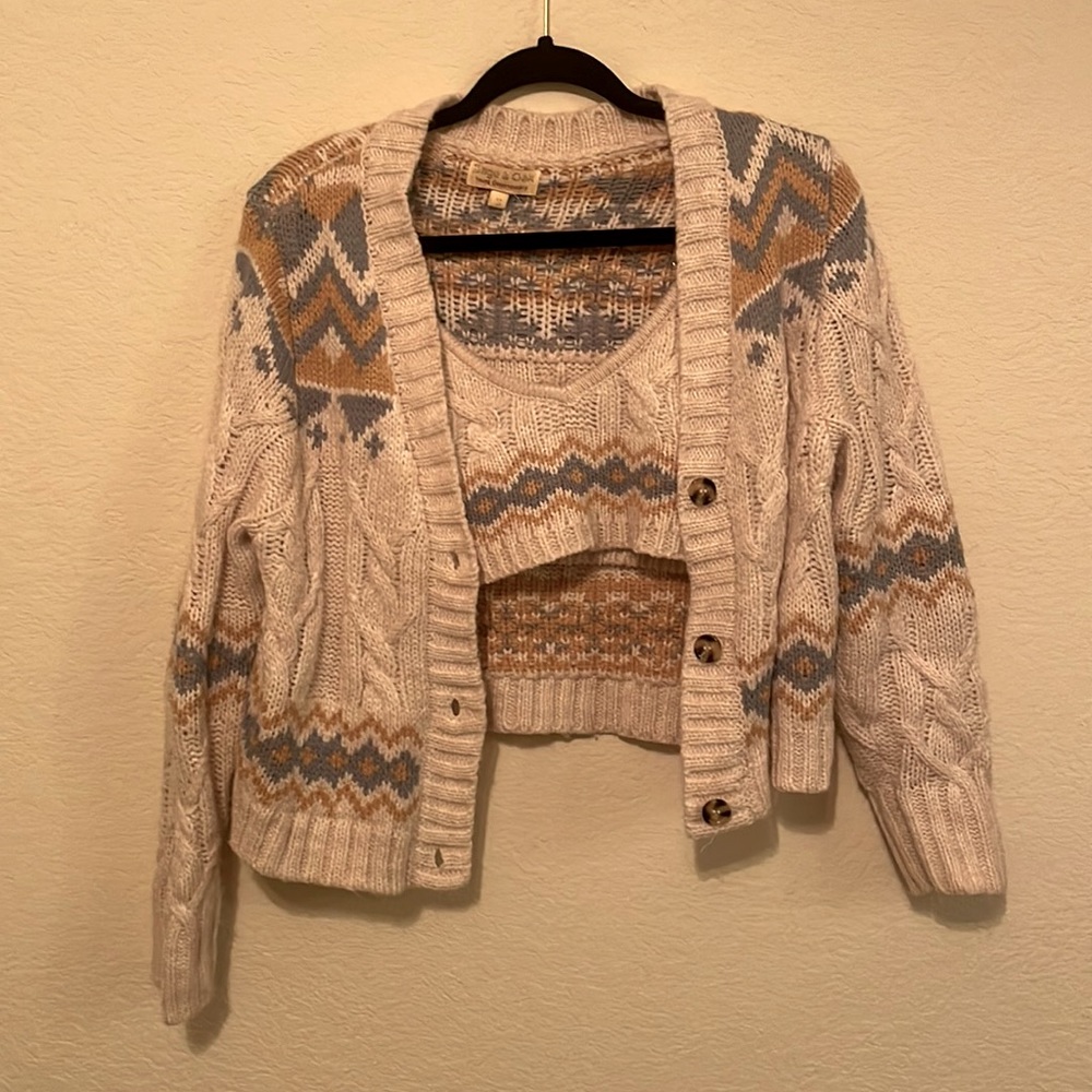 Cute and perfect for winter. Top and sweater both included in the price